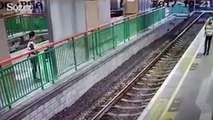 Tren bekleyen kadını raylara itti
