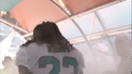 Dolphins' Jay Ajayi runs out of the tunnel