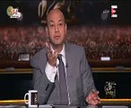 عمرو أديب يعرض شيك تبرعه بمليون جنيه لـ