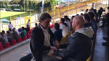 Deaf-blind man enjoys soccer match with the help of his interpreter