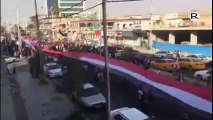 رفع أكبر علم عراقي  وجاءت هذه المبادرة لمساندة القوات الامنية من قبل أهالي كركوك بمختلف قومياتهم
