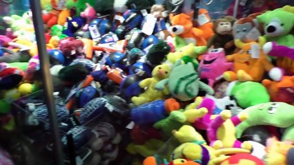 Many mini Claw Machine Wins from Dave & Busters