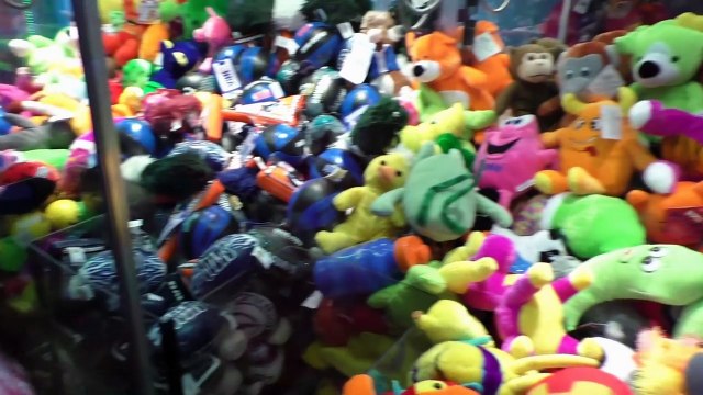 Many mini Claw Machine Wins from Dave & Busters