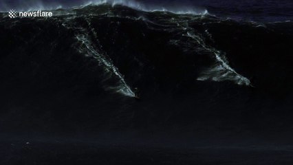 Surfers perform amazing 'double ride' in season's first major swell