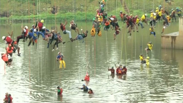 Watch: 245 Thrill-seekers jump off a bridge in Brazil for world record