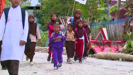 Perjuangan Polisi Ismet untuk Menyebrangkan Anak Sekolah