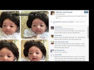 Kelucuan baby Arsy menggunakan wig