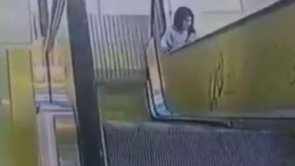 Heroes Rescue Woman Whose Shirt Got Caught On An Escalator