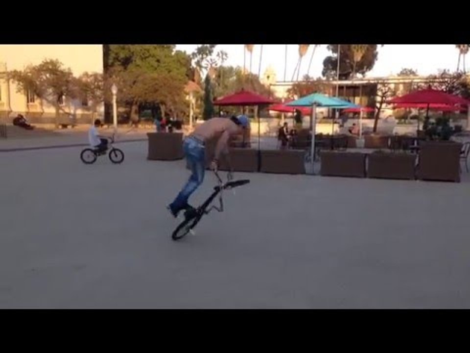 BMX Biker Blasts Tricks