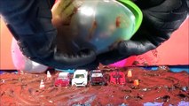SURPRISE EGGS MONSTER TRUCKS in the MUD part 5 special guest GRAVE DIGGER