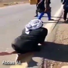 A man walking on his knees and distances so long ahead from Najaf to Karbala Arbaeen.