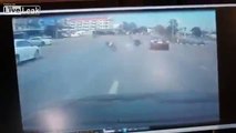 Motorcyclist trying to cross the highway gets hit by a car then ran over by another
