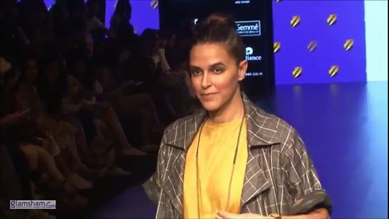 189.Neha Dhupia and Jackky Bhagnani walk the ramp at LFW 2016