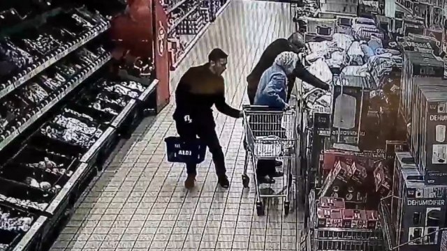 Outrageous footage shows 87- year old woman distracted so man can take her purse