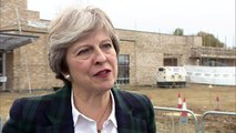 Theresa May talks mental health with construction workers