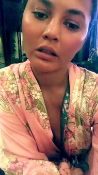 Chrissy Teigen Claps Back After Fans Call Her Out For Flashing Nipple