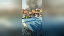 Firefighters tackle huge blaze at Mumbai slum
