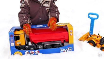 BRUDER tip truck in a snowy forest. Playing with BRUDER toys. Mercedes-Benz. Video for kids-0s1_D5v6kJk