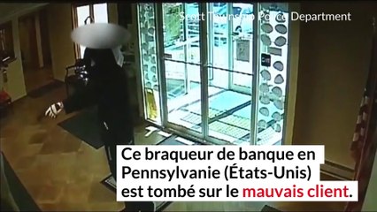 VIDÉO - États-Unis : Un homme plaque au sol un braqueur armé