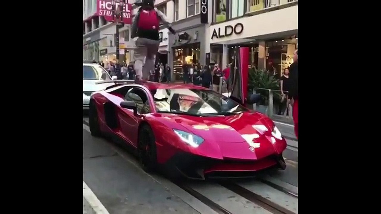 Guy runs over Lamborghini Aventador SV and got KO