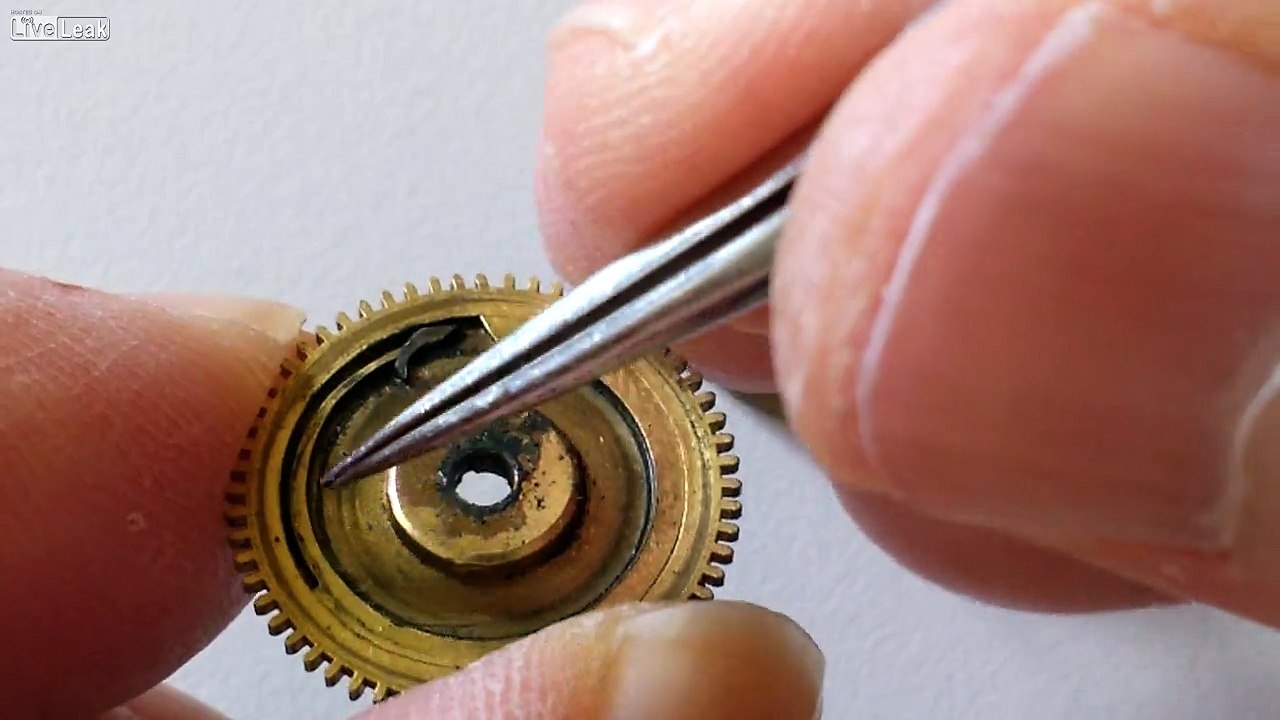 The disassembly of a fusee watch cone.