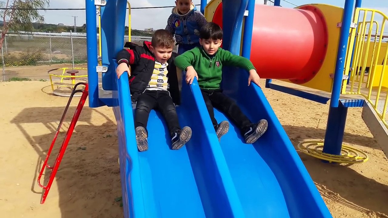 Outdoor playground for children. Slides, carousel and fun in the park-P3XG2umITqs