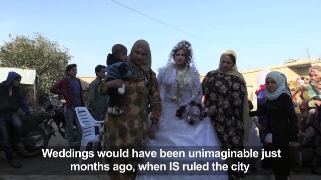 Lipstick, mixed dancing at first Raqa wedding since IS
