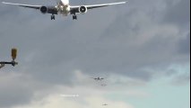 Airplanes lined up for landing at London Heathrow airport