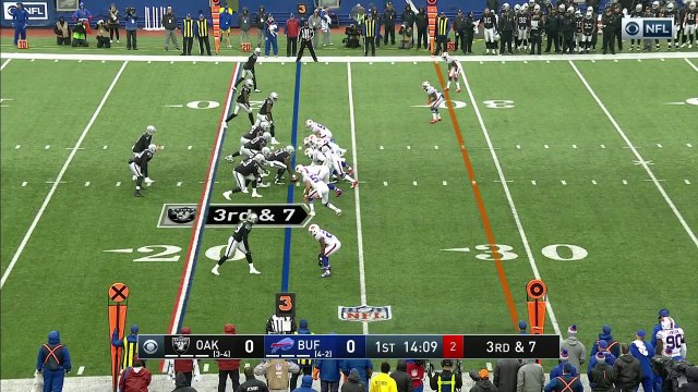 Oakland Raiders wide receiver Amari Cooper gets low and makes a scooping grab down the sideline