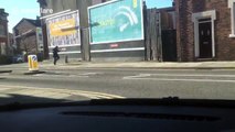 Woman dances her way down street in Liverpool