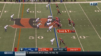 Andy Dalton gets the edge on Jeremiah George on scramble for a first down