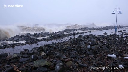 Waves pound the shorelines of Lake Superior during winter storm