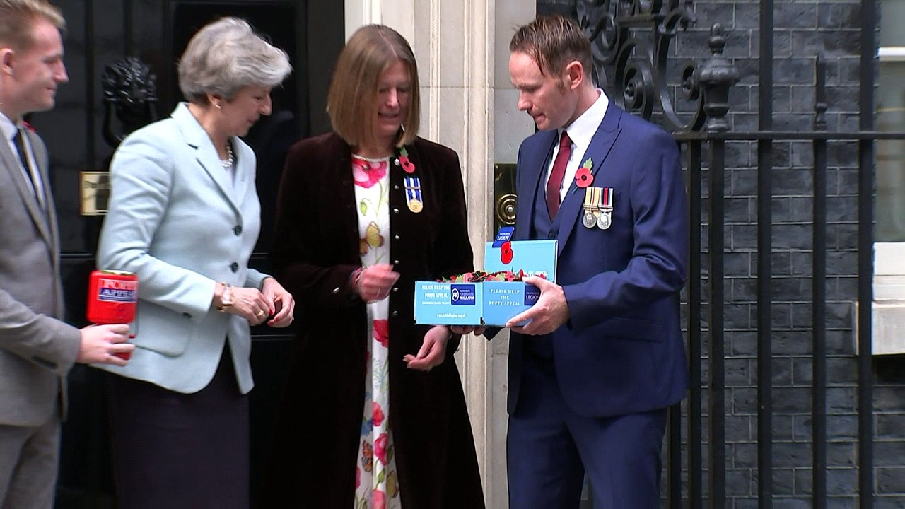 Theresa May purchases her RBL poppy