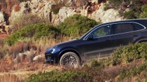 Porsche Cayenne Turbo Driving off road in Moonlight Blue Metallic