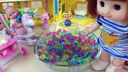 Baby doll and Kinder Joy Surprise egg toys play Orbeez