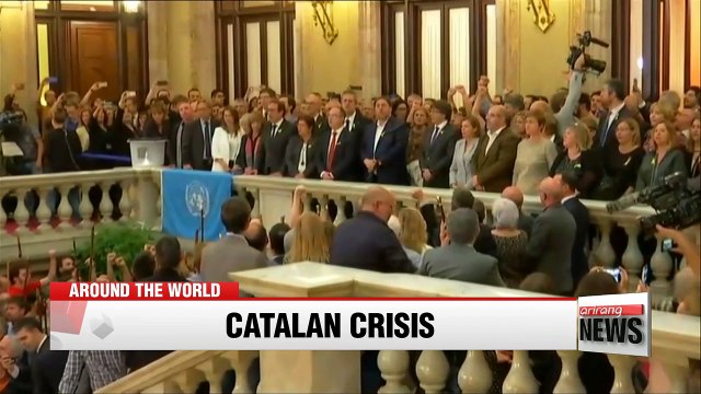 Deposed Catalan leader Carles Puigdemont flees to Brussels