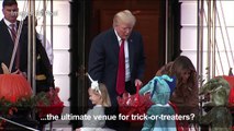 Donald and Melania Trump greet trick-or-treaters at White House