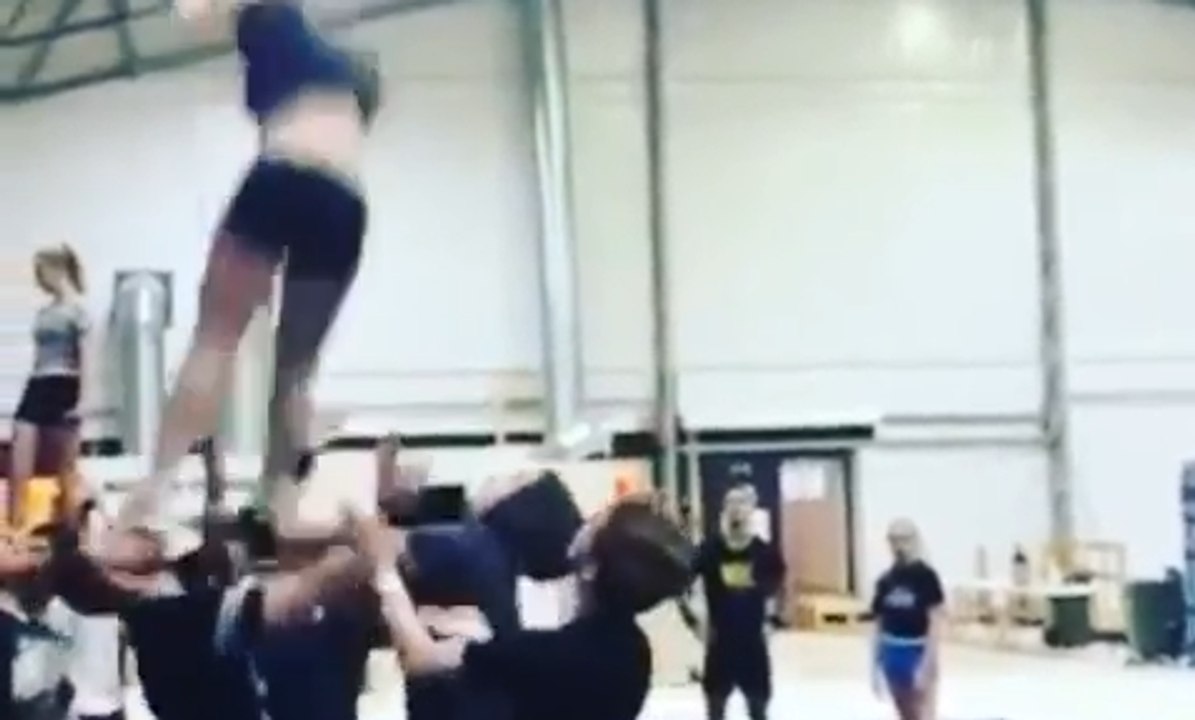 Cheerleader Accidentally Kicks Guy In Face