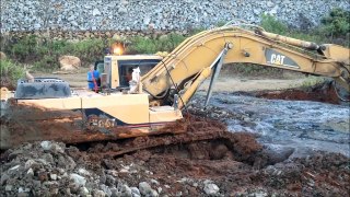 Will he ever get this excavator out?