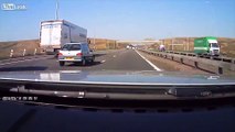 Driver who ran across a busy motorway to save another motorist was hauled before a court for driving offences