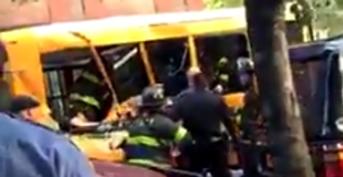 Emergency Personnel Surround School Bus After Ramming Incident in Manhattan