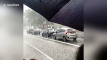 Commuters take shelter from Sao Paulo hailstorm