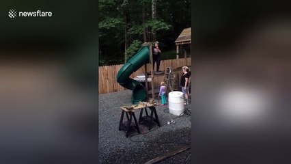 Slide topples over as grandad tries to show how safe it is