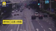 Motorcyclist crashes straight into a car in the opposing lane