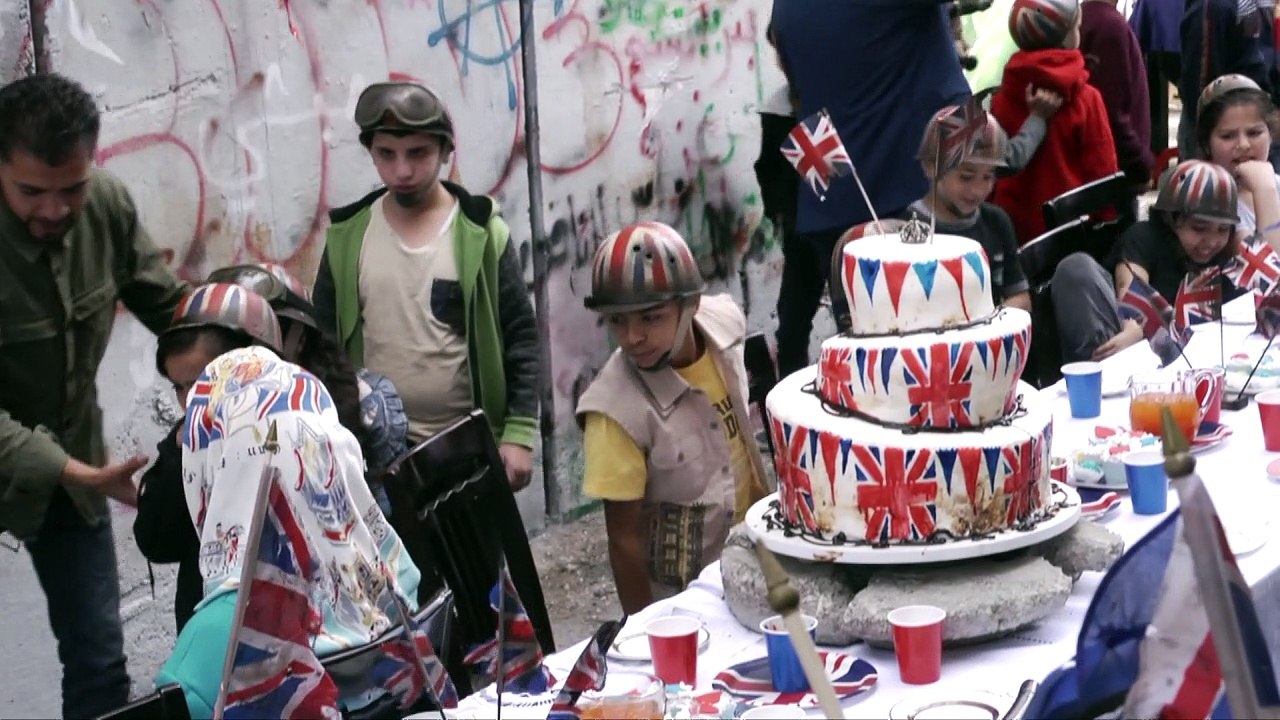 Banksy holds Balfour 'apology party' for Palestinians