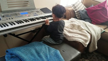 2-year-old boy rocks out to Hero from a MIDI keyboard