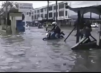 Motorbike Sucked by a flood hole