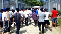 Manus Island refugees dig for water as Australia closes camp