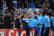 Patrice Evra sent off for kicking a fan in the head before the Marseille game even kicked off