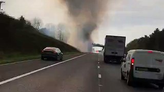 Truck carrying fireworks for Guy Fawkes night catches fire on the M1 motorway in England